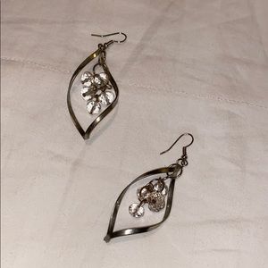 Dangly silver with clear hanging crystals.